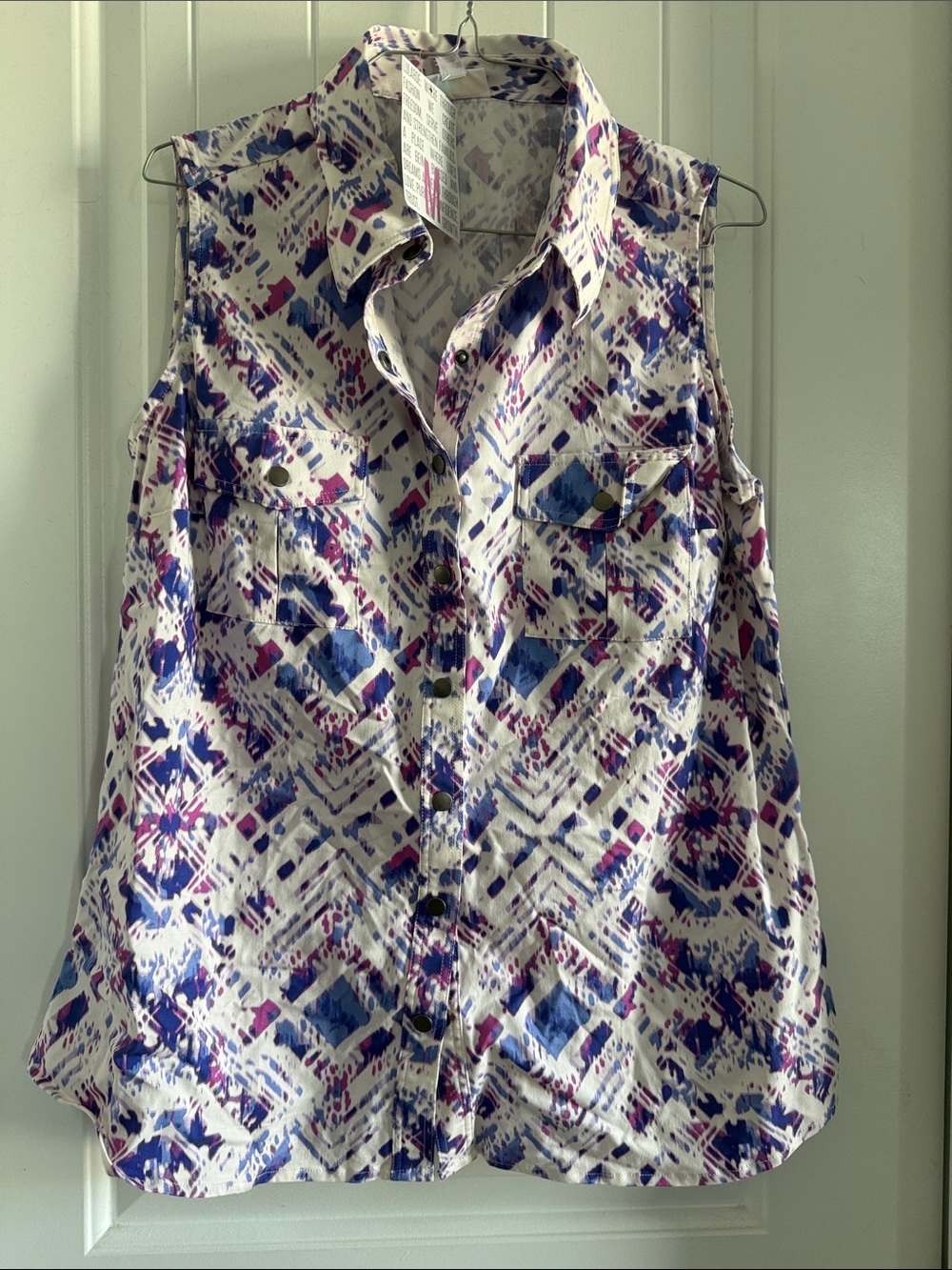 LuLaRoe Roxann Sleeveless Button Front Blouse in White with Blue & Purple Print